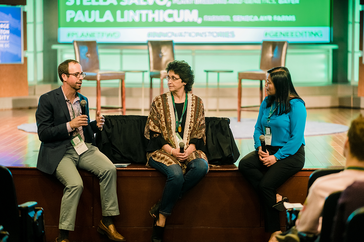 Journalist Dan Gilgoff, moderates a breakout session on gene editing, featuring speakers Paula Linthicum, co-owner of Seneca Ayr Farm, and Stella Salvo, a plant breeder and geneticist from Bayer.